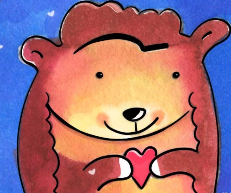 Cute bear holding a heart