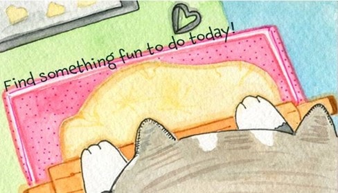 Cat paws on colorful notebooks — Find something fun to do today!